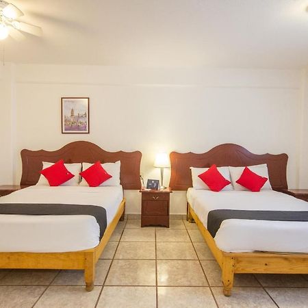 Capital O Hotel Suites Andrade León Exterior foto